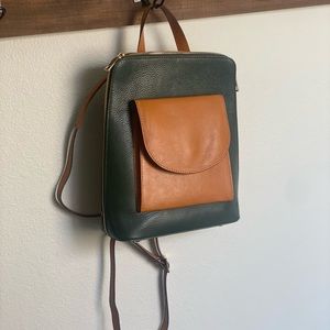 Leather backpack purse, can wear as backpack or crossbody, zips to the side